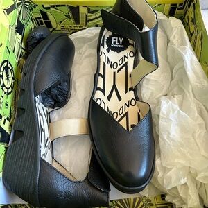 Fly London Black Leather Cutout Wedges